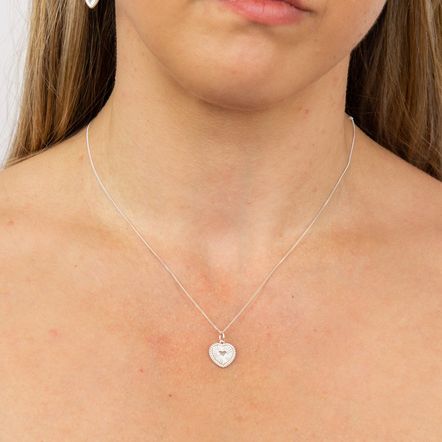 Sunray Texture Heart Pendant